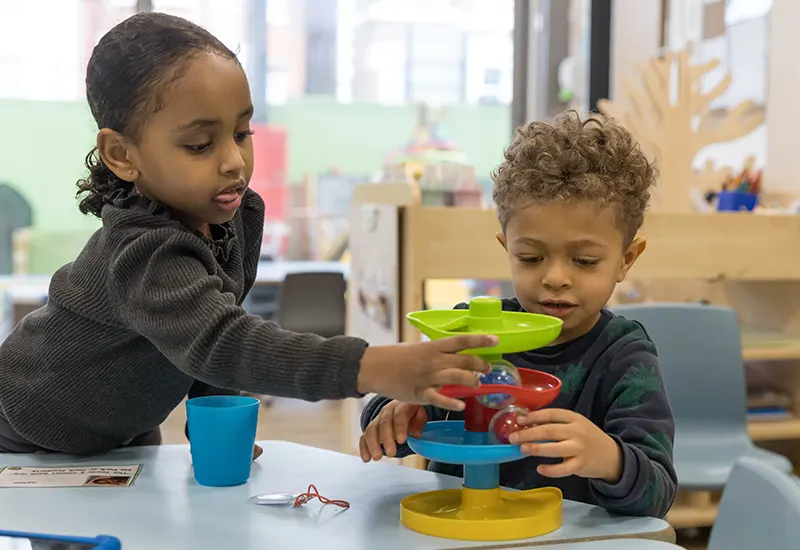 Children playing and learning at Monkey Puzzle Kingston