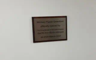 Plaque commemorating the official opening of Monkey Puzzle Greenford by Prime Minister Boris Johnson on March 25th, 2021.