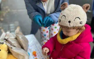 Kids exploring outdoor toys and learning at Monkey Puzzle Day Nurseries, fostering early childhood development in a safe and joyful environment.