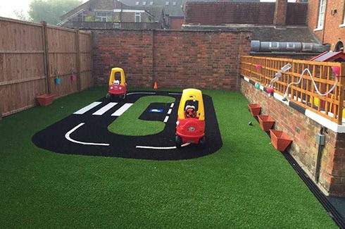 Outside play space at Edenbridge nursery Outside play space at Edenbridge nursery