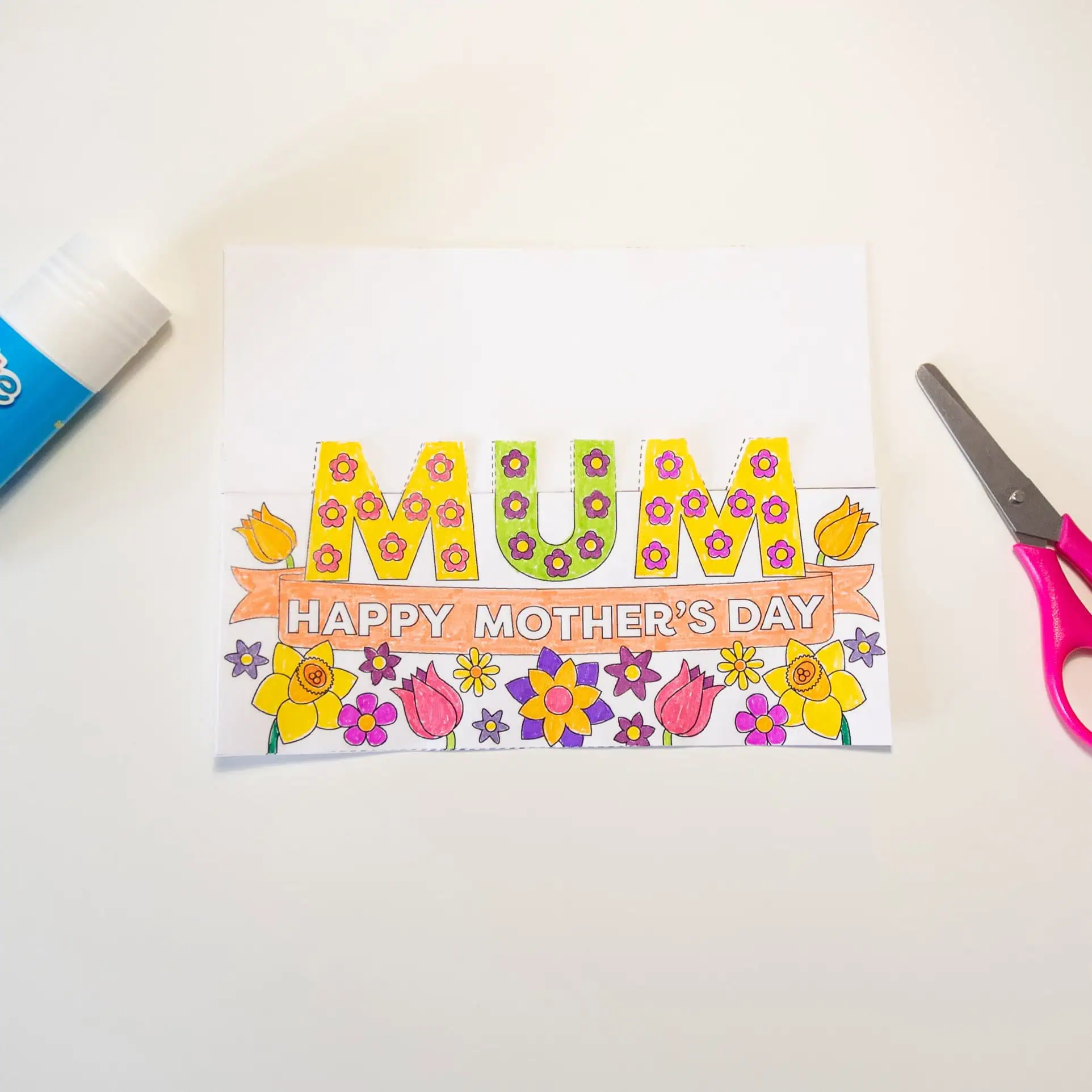 Colorful Mother's Day drawing with flowers and "Happy Mother's Day" message, perfect for nursery art projects and children's crafts, related to Mother's Day celebrations at Monkey Puzzle Day Nurseries.