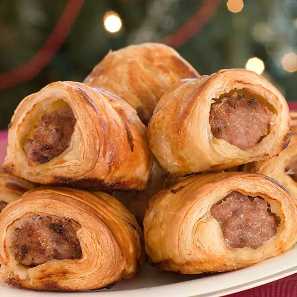 Delicious sausage rolls with flaky pastry, perfect for kids' snacks or parties at Monkey Puzzle Day Nurseries. Freshly baked, tasty, and ideal for early childhood nutrition.