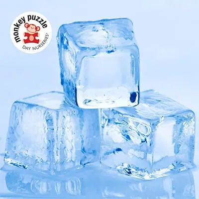 Fresh ice cubes stacked, symbolizing cleanliness and freshness at Monkey Puzzle Day Nurseries.