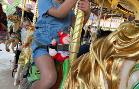 Enjoying the carousel in Disneyland