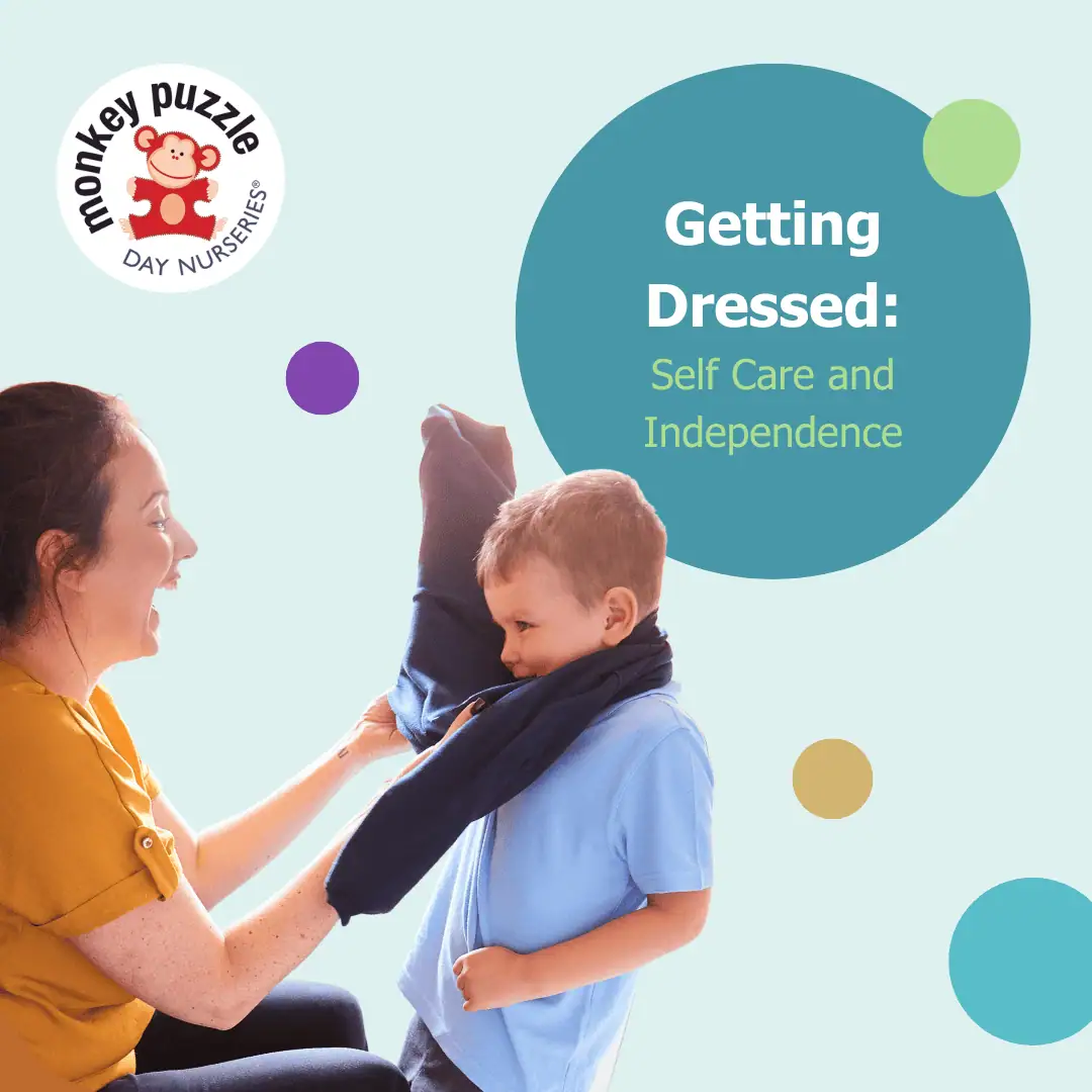 Getting dressed by a caregiver at Monkey Puzzle Day Nurseries promoting self-care and independence skills.