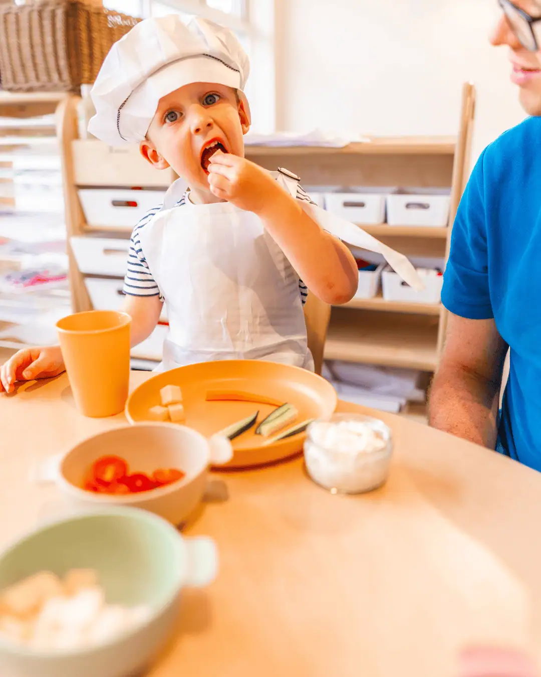Healthy eating habits at Monkey Puzzle Day Nurseries with young children enjoying nutritious snacks.