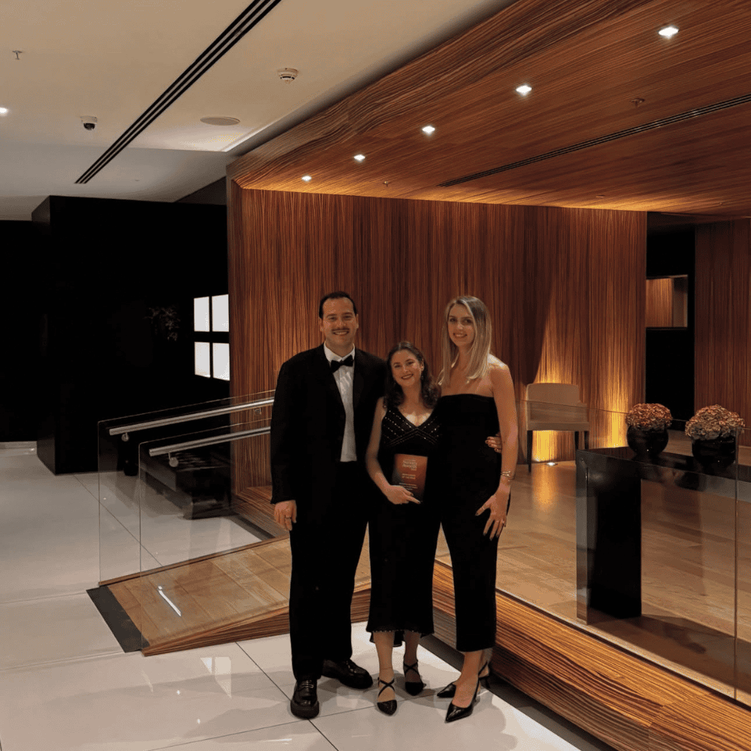 Elegant event at a stylish venue with warm wood decor, perfect for celebrations or corporate gatherings, showcasing sophistication and modern interior design.