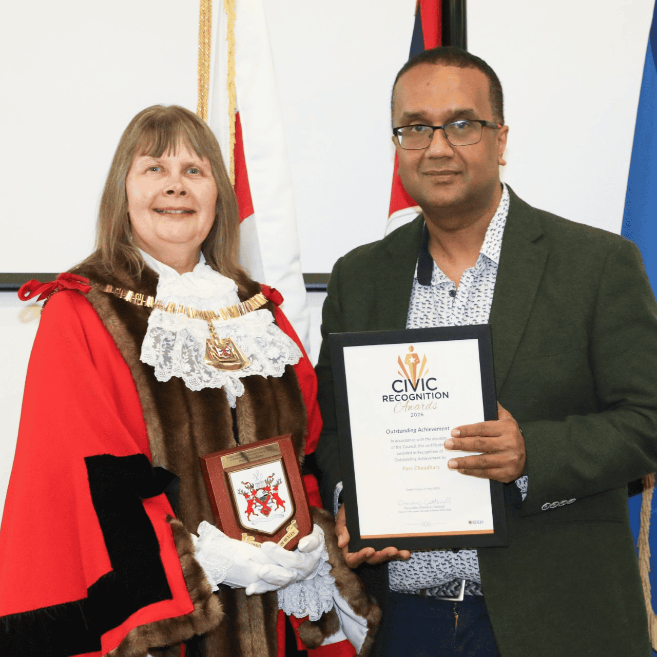 Parv Choudhury Civic Recognition Award Parv Choudhury receiving the Civic Recognition Award at a formal event, with a woman in ceremonial robes presenting the award.